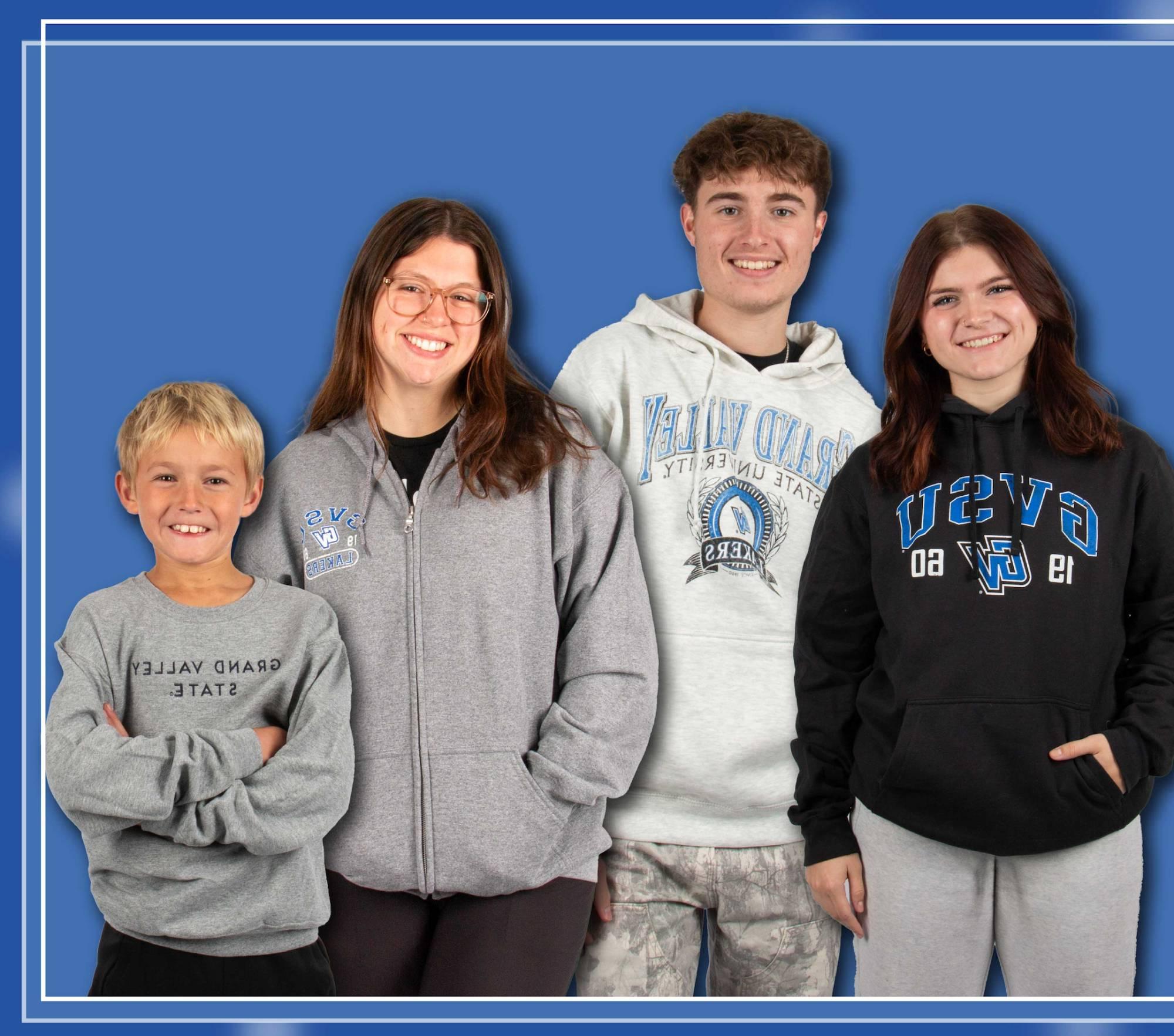 4 people modeling GVSU sweatshirts